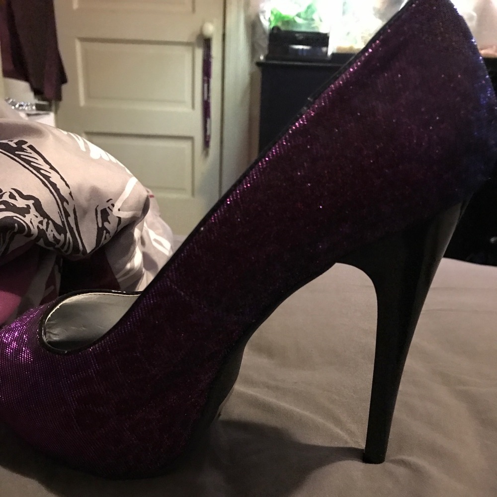 Shi purple open toe pumps.